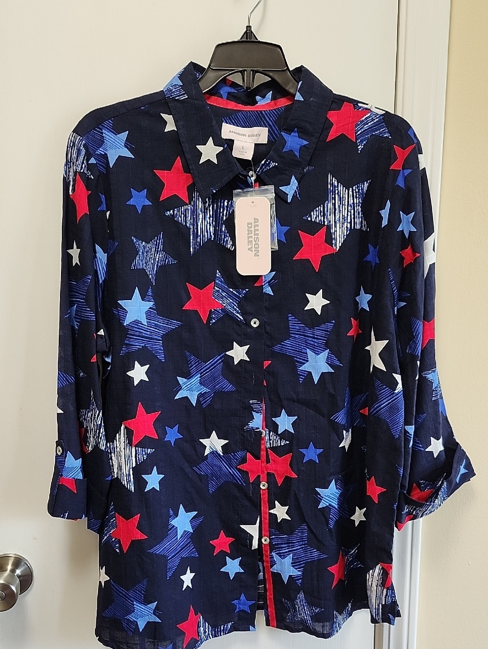 Allison Daley Navy Shirt with Blue and Red Stars. 3/4 Sleeves.
